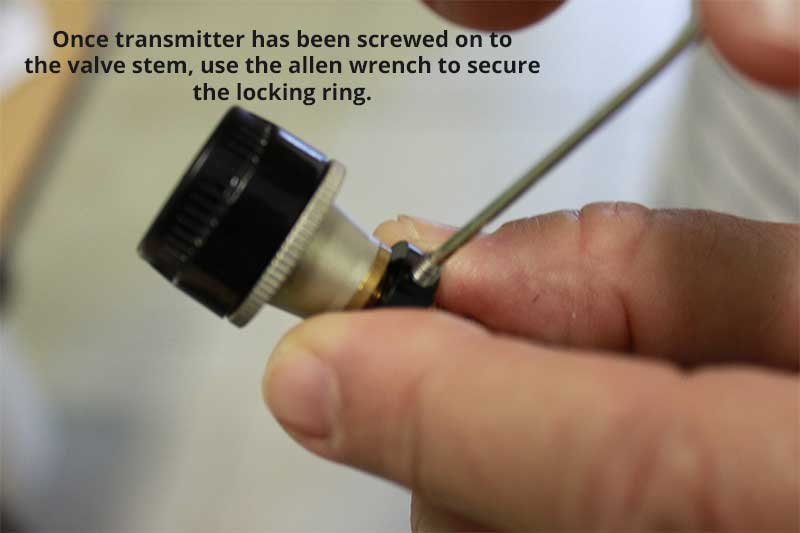 Screw in each screw to secure the locking ring and transmitter.